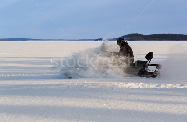 man riding a snowmobile Stock photo © RuslanOmega