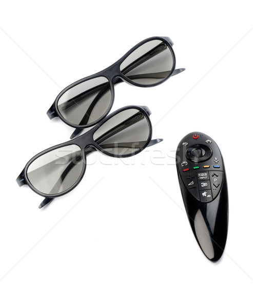 Two pairs of 3D glasses and remote control TV. Stock photo © RuslanOmega