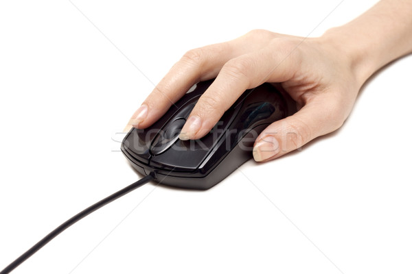 Feminine hand keeps computer mouse Stock photo © RuslanOmega