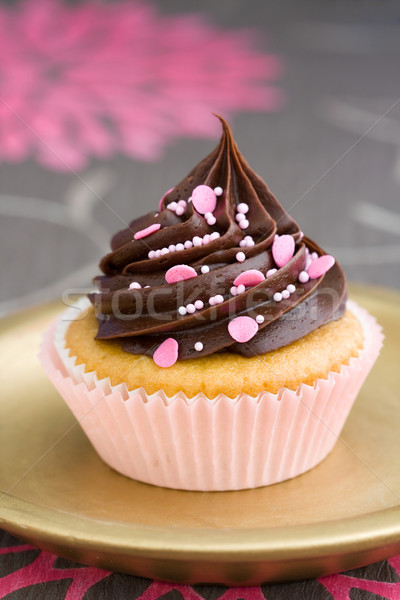 Stock photo: Pink chocolate cupcake