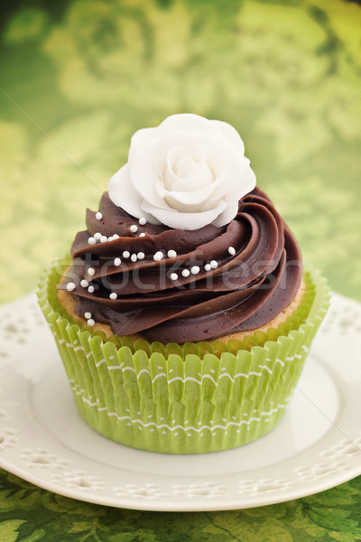 Stieg Cupcake dekoriert Schokolade Zucker Blumen Stock foto © RuthBlack