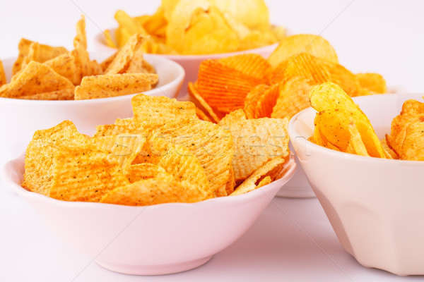 Stock photo: Potato and wheat chips in bowls