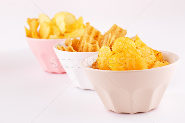 Potato and wheat chips in bowls Stock photo © ruzanna