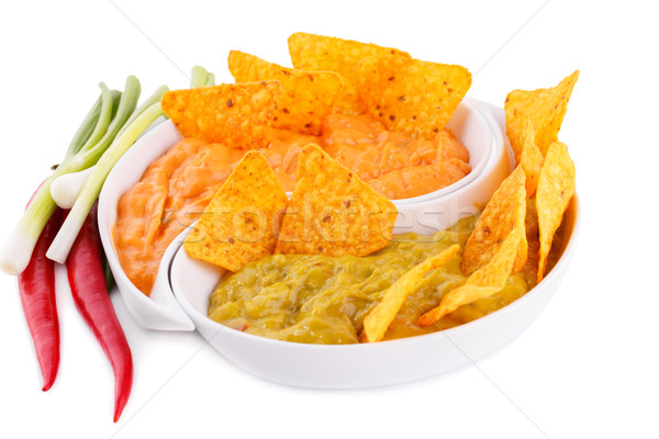 Nachos, guacamole and cheese sauce,  vegetables Stock photo © ruzanna