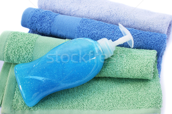 Towels and liquid soap bottle Stock photo © ruzanna