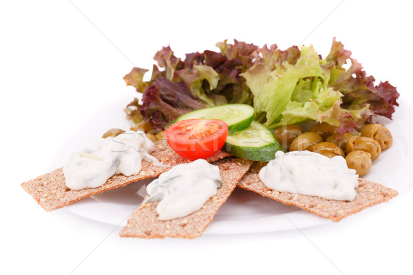 Cracker with fresh vegetables and cream Stock photo © ruzanna