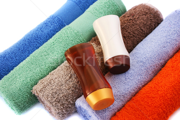 Asciugamani shampoo bottiglie colorato bianco spiaggia Foto d'archivio © ruzanna