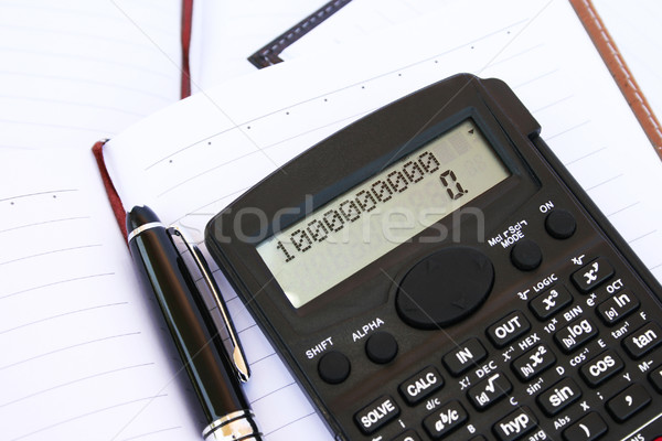 Calculator, pen and notebook Stock photo © ruzanna
