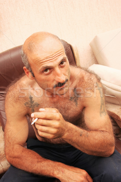 Smoking man Stock photo © ruzanna