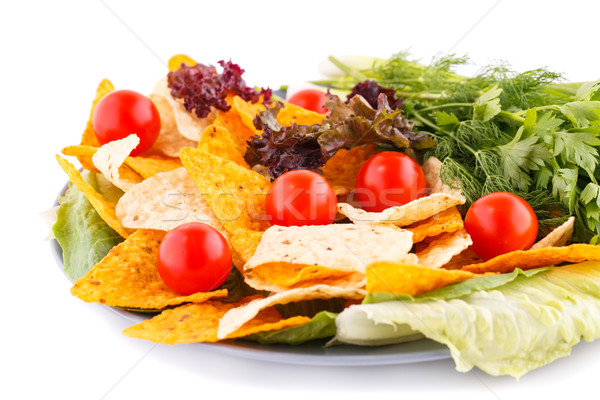 Nachos cseresznye saláta gyógynövények tányér fehér Stock fotó © ruzanna