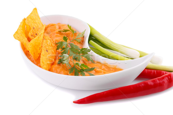 Nachos, cheese sauce,  vegetables Stock photo © ruzanna