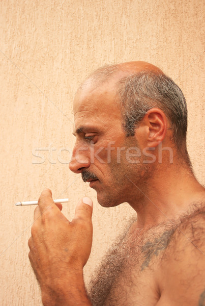Smoking man Stock photo © ruzanna