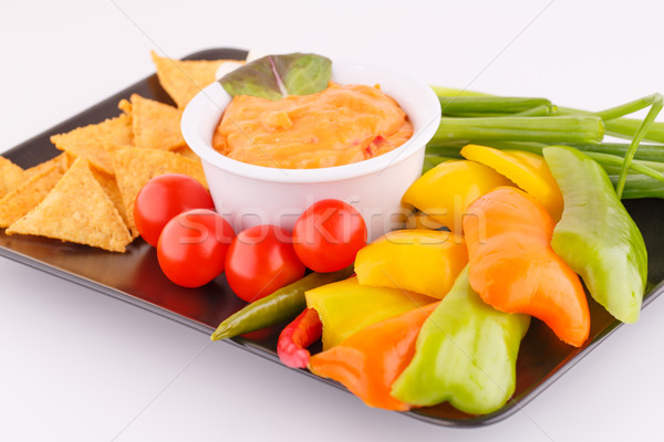 Nachos sajt mártás zöldségek barna tányér Stock fotó © ruzanna