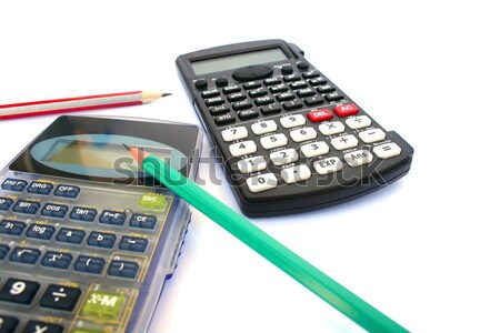 Stock photo: Calculator and pen