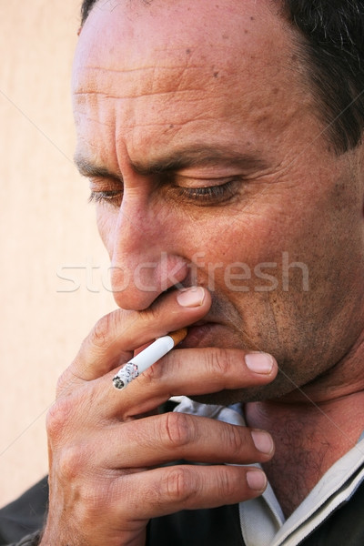 Smoking man Stock photo © ruzanna