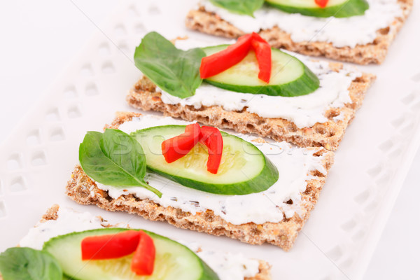 Stock photo: Cracker with fresh vegetables and cream