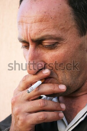 Smoking man Stock photo © ruzanna