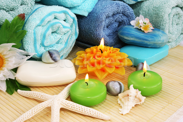 Towels, soaps, flowers, candles Stock photo © ruzanna