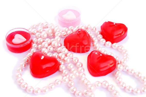 Stock photo: Red candles and necklace