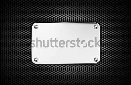 Metal mesh grill with chrome banner. Perfect for background. Stock photo © rzymu