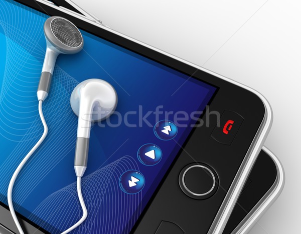 Black smartphones and earphones. Stock photo © rzymu