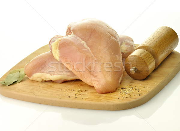 Nyers csirkemell hús fából készült vágódeszka tábla Stock fotó © saddako2