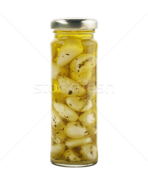 Sticlă borcan usturoi ulei de măsline izolat alb Imagine de stoc © saddako2