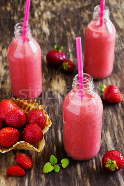 strawberry smoothie in a bottle Stock photo © saharosa