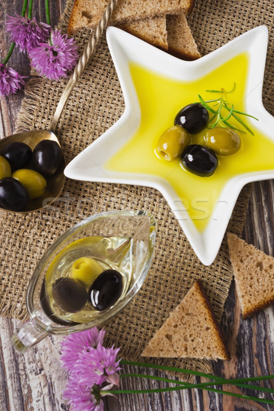 Diétás reggeli különböző olajbogyók olívaolaj csészealj Stock fotó © saharosa