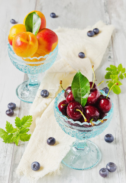 cherries and apricots Stock photo © saharosa