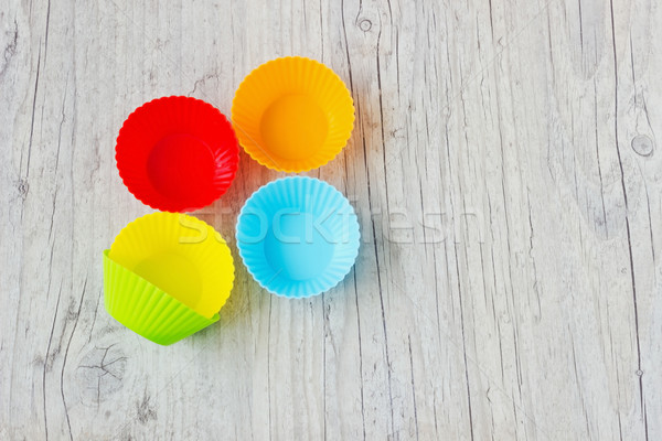 [[stock_photo]]: Gâteaux · coloré · silicone · bois · espace · de · copie