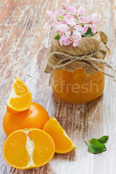 Arancione vetro jar fresche arance fiori Foto d'archivio © saharosa