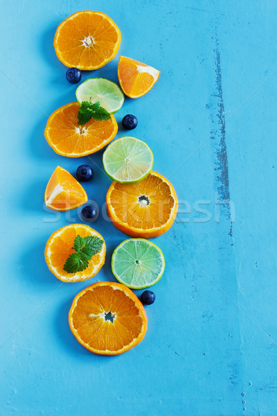 Szeletel citrus gyümölcs kék fából készült diéta felső Stock fotó © saharosa