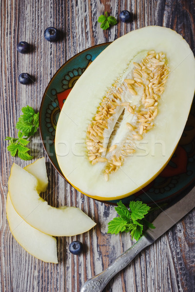 Dinnye áfonya tányér sötét fából készült szelektív fókusz Stock fotó © saharosa