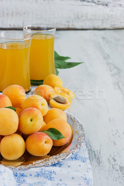 ripe apricots and apricot juice Stock photo © saharosa