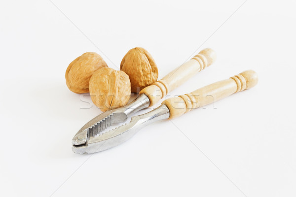 щипцы орехи белый здоровья диета продовольствие Сток-фото © saharosa
