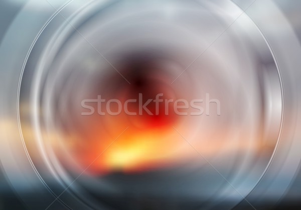 Abstract surreal futuristic circles on sunset sky background Stock photo © saicle