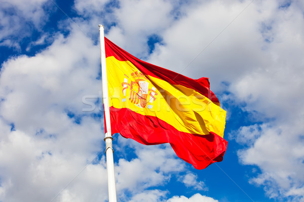 ストックフォト: スペイン国旗 · フラグ · スペイン · 青空 · 移動 · 風