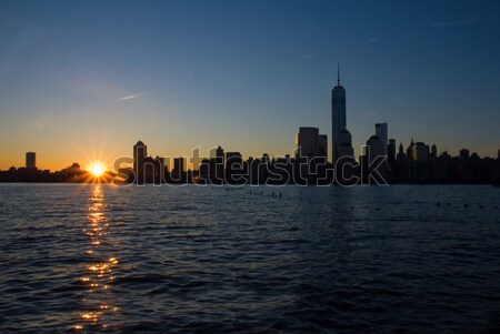 New York City Skyline Sun Rising Over Buildings Stock photo © saje