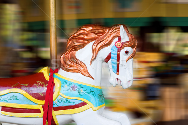 Carrusel caballo movimiento blanco azul velocidad Foto stock © saje