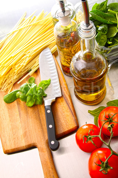 Preparation for making fettuccine with sauce and basil  Stock photo © Sandralise