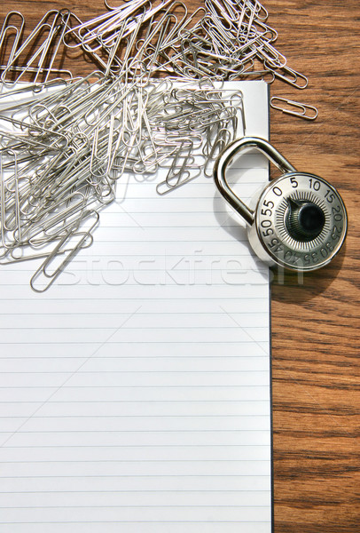 White pad with paper clips, school lock  Stock photo © Sandralise