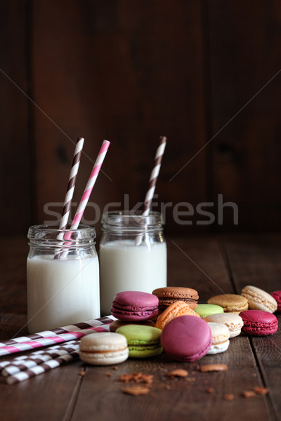 Glass jars with straws and macaroons Stock photo © Sandralise