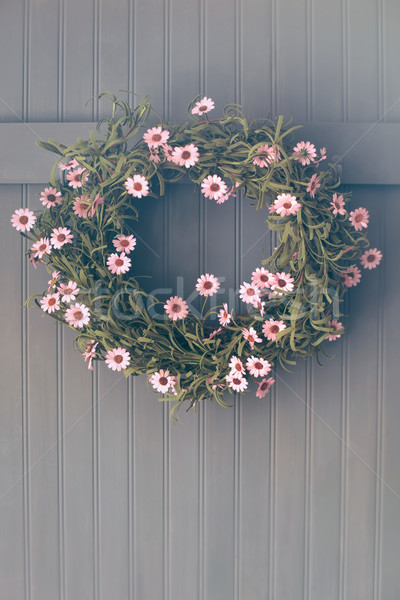 Spring wreath with flowers hanging on hook Stock photo © Sandralise