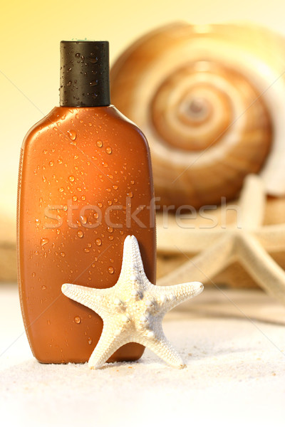 Bronzeado loção conchas ensolarado sol corpo Foto stock © Sandralise