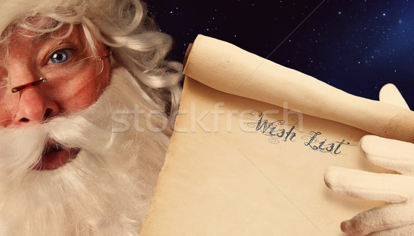 Closeup of Santa Clause holding scroll  Stock photo © Sandralise