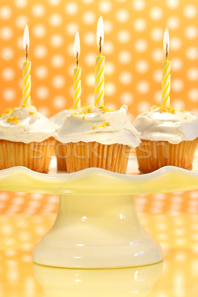 Cupcakes with orange zest sprinkled on top Stock photo © Sandralise