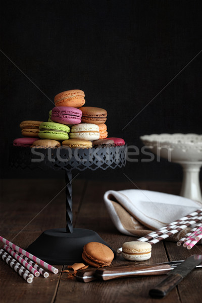 Macaroons on cake stand with dark background Stock photo © Sandralise