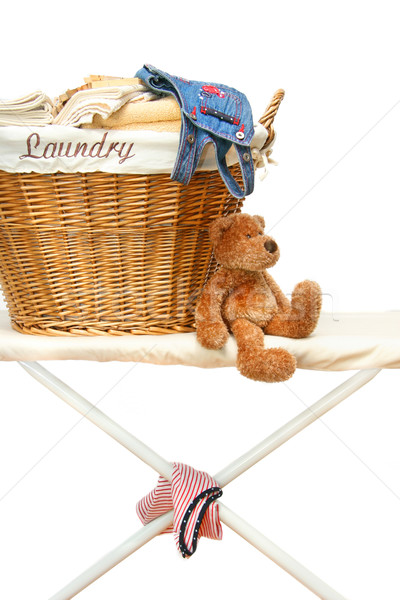 Teddy bear with laundry basket on ironing board  Stock photo © Sandralise