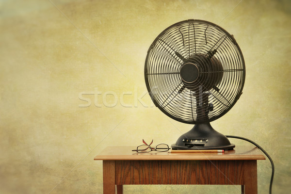 Old electric fan on table with retro look Stock photo © Sandralise